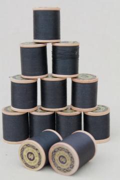 catalog photo of vintage sewing notions, new old stock 12 reels black cotton thread wood spools