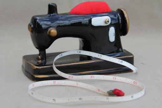 photo of vintage sewing stand w/ pincushion & tape measure, antique sewing machine figural pin cushio #1