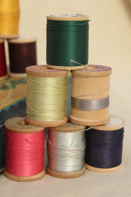 photo of vintage sewing thread on wood spool reels, pure silk & Sylko type mercerized cotton #6
