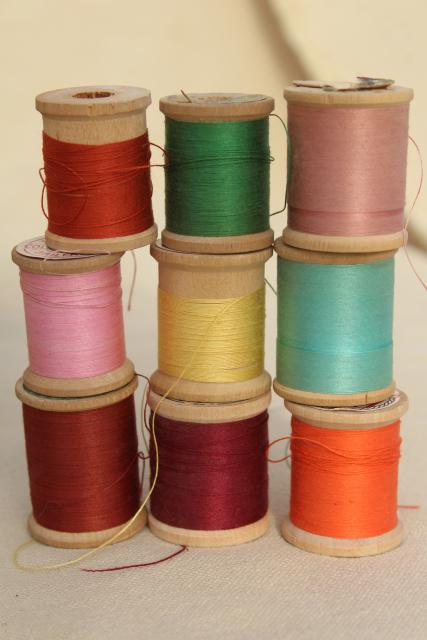 photo of vintage sewing thread on wood spool reels, pure silk & Sylko type mercerized cotton #7