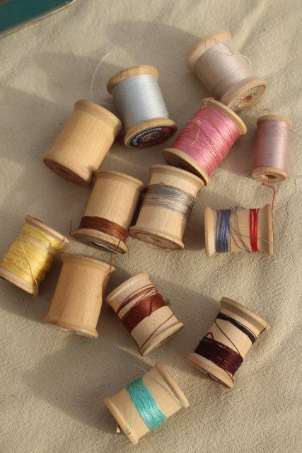 photo of vintage sewing thread on wood spool reels, pure silk & Sylko type mercerized cotton #9