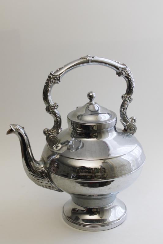 photo of vintage silver chrome tea kettle teapot on stand, old fashioned English tea party decor #1