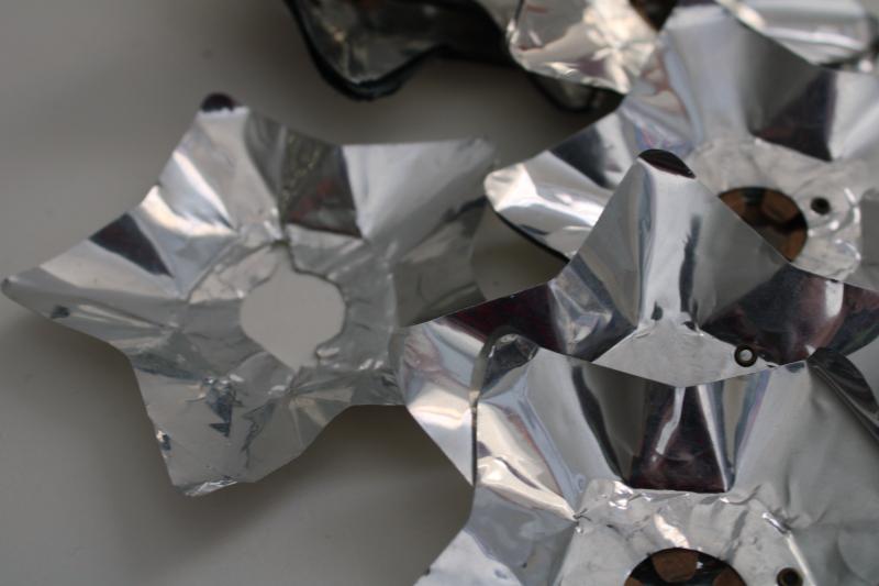 photo of vintage silver foil stars or flowers reflectors for early electric Christmas lights #3
