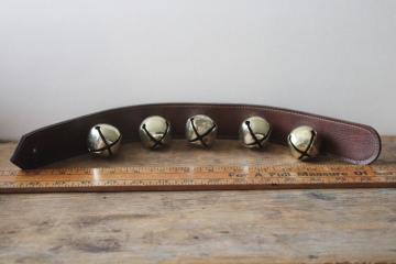 catalog photo of vintage sleigh bells door hanger, faux leather strap w/ big metal jingle bells 