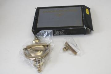 catalog photo of vintage solid brass door knocker new in box, shiny polished bright golden brass made in Spain 