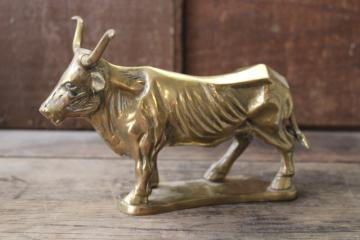 catalog photo of vintage solid brass trophy cattle longhorn bull figurine western style large heavy paperweight