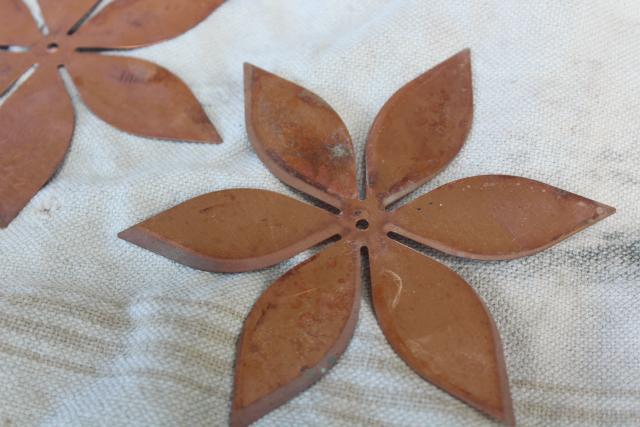 photo of vintage solid copper sheet cut out flowers, flat starburst art shapes w/ center hole #3