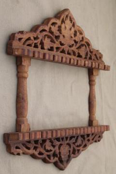 catalog photo of vintage spoon holder, hand carved Sheesham wood wall rack for souvenir spoons