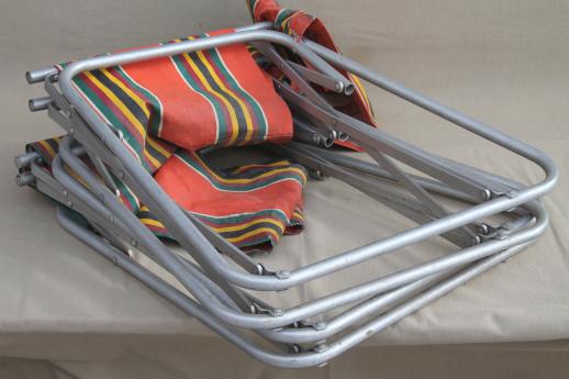 photo of vintage steel folding chairs striped awning canvas seats & backs Airstream trailer glamping #5