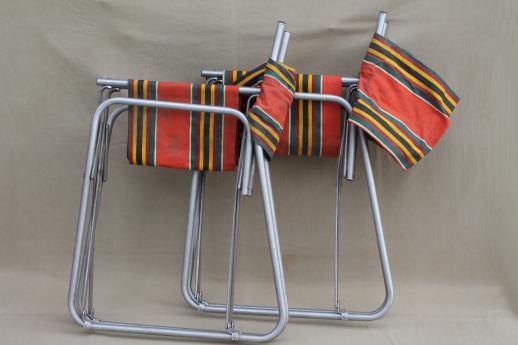 photo of vintage steel folding chairs striped awning canvas seats & backs Airstream trailer glamping #13