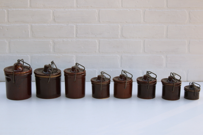 photo of vintage stoneware crock jars, lot of 8 old brown cheese crocks w/ wire bails and lids different sizes #1