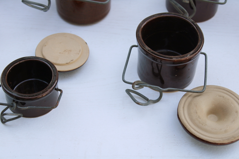 photo of vintage stoneware crock jars, lot of 8 old brown cheese crocks w/ wire bails and lids different sizes #6