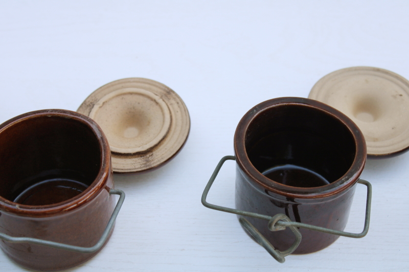 photo of vintage stoneware crock jars, lot of 8 old brown cheese crocks w/ wire bails and lids different sizes #7