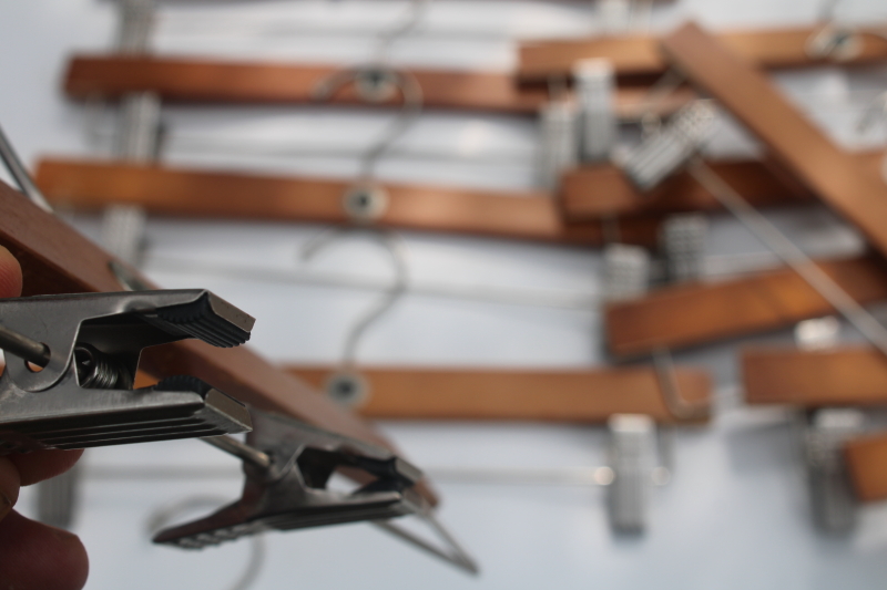 photo of vintage store display clothes hangers, American Eagle Outfitters wood hangers with metal clips  #5