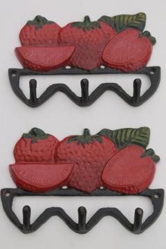 catalog photo of vintage style new cast iron wall mount hooks, red painted strawberries for a country kitchen