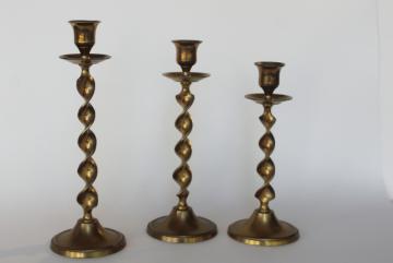 catalog photo of vintage tall solid brass candlesticks, ribbon twist trio graduated sizes candle holders set