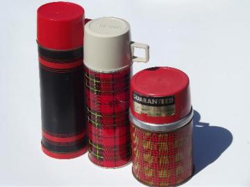 catalog photo of vintage thermos bottles for lunch or picnics, red tartanware plaid