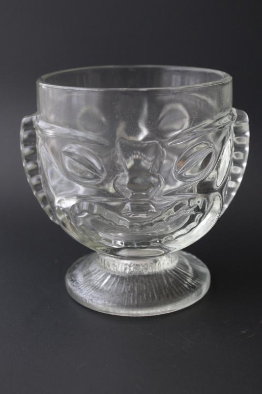 photo of vintage tiki cup or vase, large heavy clear glass head, happy / sad two faced mug #1