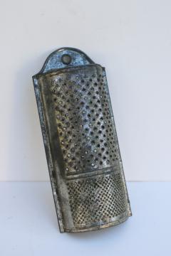 catalog photo of vintage tin nutmeg grater, primitive rustic old kitchen tool wall hanging