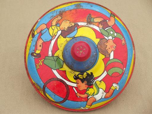 photo of vintage tin toy spinning top, metal top w/ worn old antique paint #2