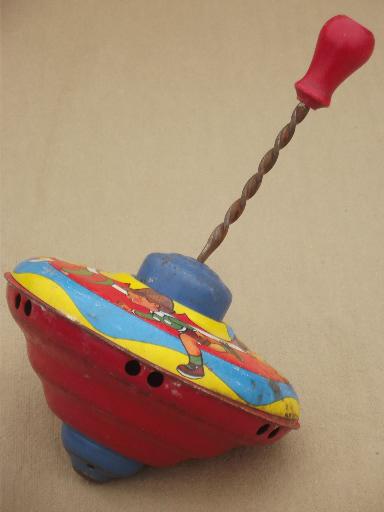 photo of vintage tin toy spinning top, metal top w/ worn old antique paint #4