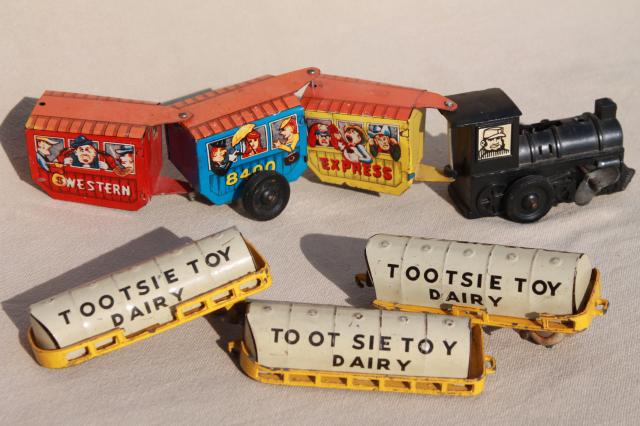 photo of vintage tin toys, Tootsie toy dairy milk truck cars, Western Express train #1