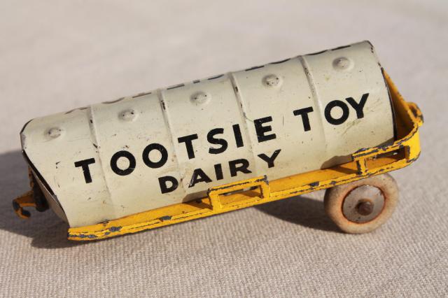 photo of vintage tin toys, Tootsie toy dairy milk truck cars, Western Express train #2