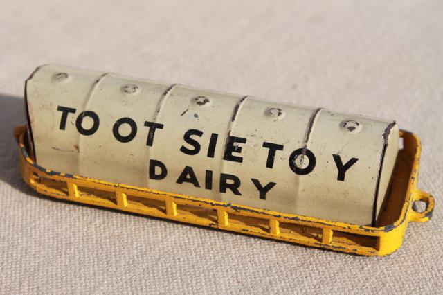 photo of vintage tin toys, Tootsie toy dairy milk truck cars, Western Express train #3