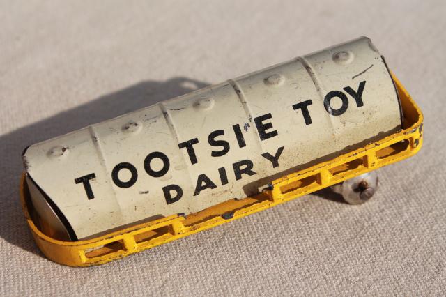 photo of vintage tin toys, Tootsie toy dairy milk truck cars, Western Express train #4