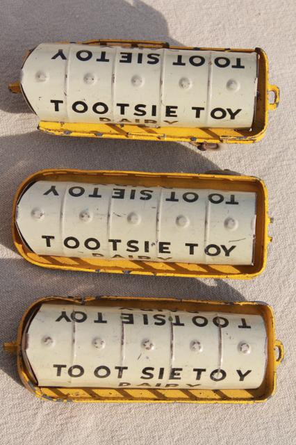 photo of vintage tin toys, Tootsie toy dairy milk truck cars, Western Express train #5