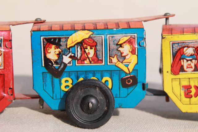 photo of vintage tin toys, Tootsie toy dairy milk truck cars, Western Express train #12