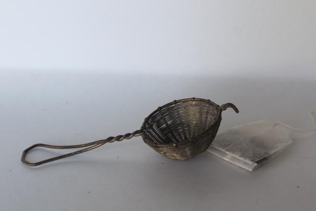 photo of vintage tiny wire tea or coffee strainer, handmade silvered brass wirework sieve #1