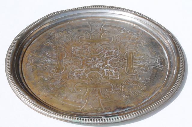 photo of vintage tray or round serving plate, worn antique tin silver wash over solid brass #1