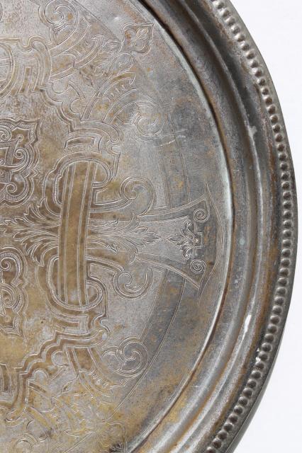 photo of vintage tray or round serving plate, worn antique tin silver wash over solid brass #8