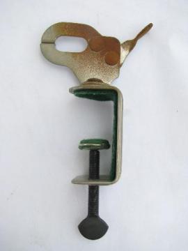 catalog photo of vintage utilitarian steel sewing bird, patented needlework clamp for table