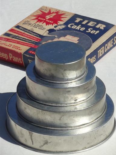 photo of vintage wedding cake pans in original box, round tier tiered pans set #1