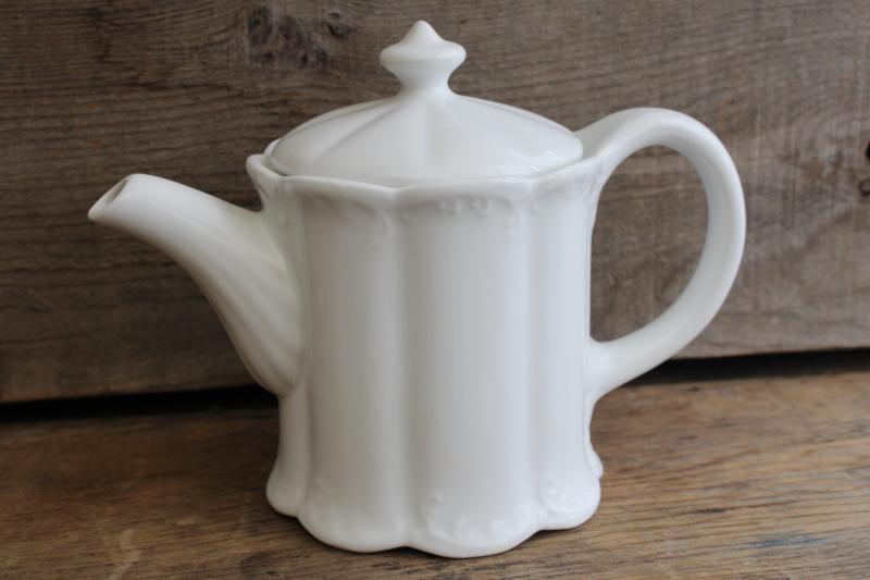 photo of vintage white ironstone china coffee or tea pot, oval shape w/ embossed pattern #1