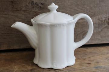 catalog photo of vintage white ironstone china coffee or tea pot, oval shape w/ embossed pattern