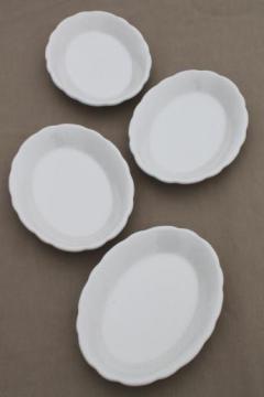 catalog photo of vintage white ironstone oval plates, Buffalo china restaurantware platter plates set