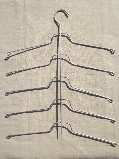 photo of vintage wire hangers, old metal clothes rack hangers w/ stacking arms #2