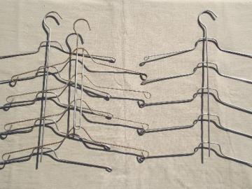 catalog photo of vintage wire hangers, old metal clothes rack hangers w/ stacking arms