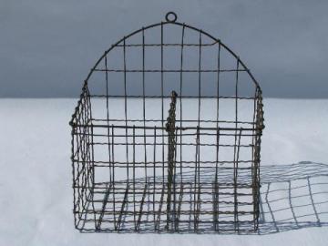 catalog photo of vintage wire wall basket, old primitive wirework art