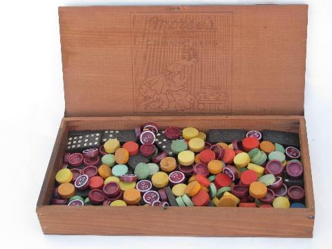 photo of vintage wood chocolate box full old wooden game parts, altered art lot #1