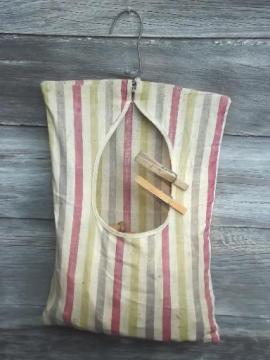 catalog photo of vintage wood clothespins in old cotton clothespin bag for laundry room or wash line