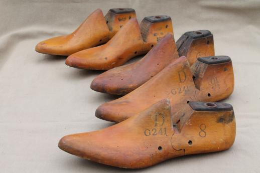 photo of vintage wood feet, wooden foot shoe stretchers or cobbler's lasts for shoemaking #1