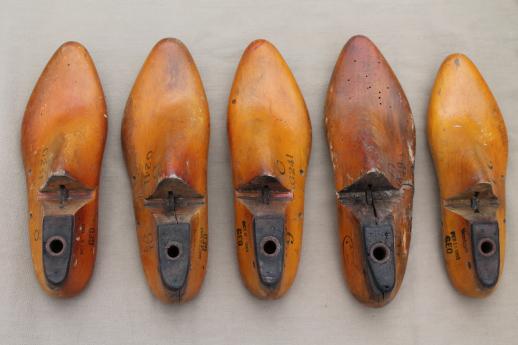 photo of vintage wood feet, wooden foot shoe stretchers or cobbler's lasts for shoemaking #4