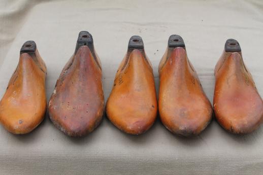 photo of vintage wood feet, wooden foot shoe stretchers or cobbler's lasts for shoemaking #6