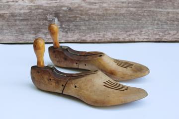 catalog photo of vintage wood shoe stretchers, pair of wooden feet foot shape shoe trees 