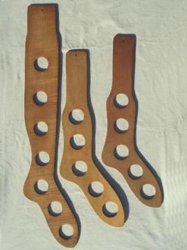 catalog photo of vintage wood sock stretchers, wooden feet in large sizes for stockings & socks
