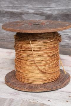 catalog photo of vintage wood spool of rope, rustic farm primitive natural sisal hay bale twine